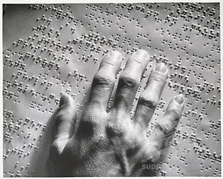 http://vantheyologi.files.wordpress.com/2009/10/reading_braille.jpg